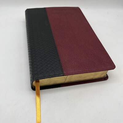 The New American Catholic Bible Readers Edition Leather Basketweave Oxford-image