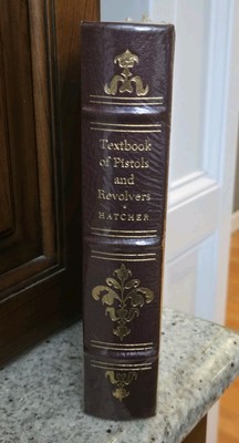 RARE VTG NEW SEALED TEXTBOOK OF PISTOLS AND REVOLVERS by HATCHER LEATHER BOUND-image