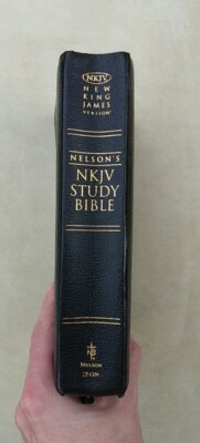 Nelson's NKJV Study Bible Black Bonded Leather 2845N - Has Some Liquid Damage--image