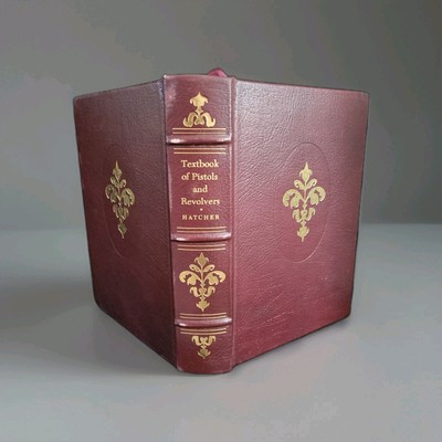 Textbook of Pistols and Revolvers. By Mayor Julian S. Hatcher. Leather bonding. -image